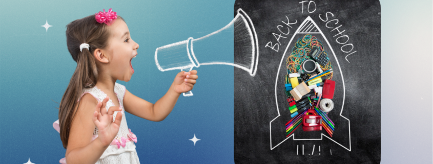 Confident child with a megaphone and back to school rocket drawing on a blackboard at School Beyond Limitations