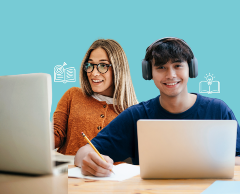 Two students smiling confidently while learning in a supportive educational environment